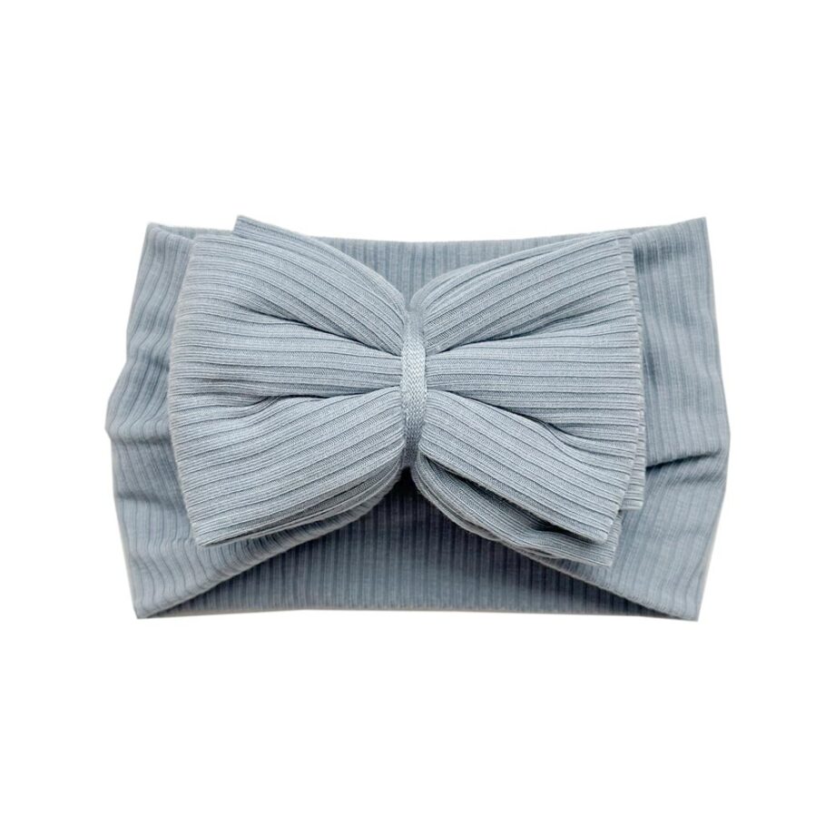 An Ellie - Bamboo Baby Knotted Headwrap with a Tiny Knot Co bow.