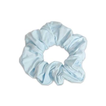 A light blue scrunchie from Tiny Knot Co on a white background.