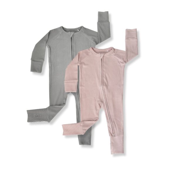 A pair of grey and pink pajamas by Tiny Knot Co on a white background.