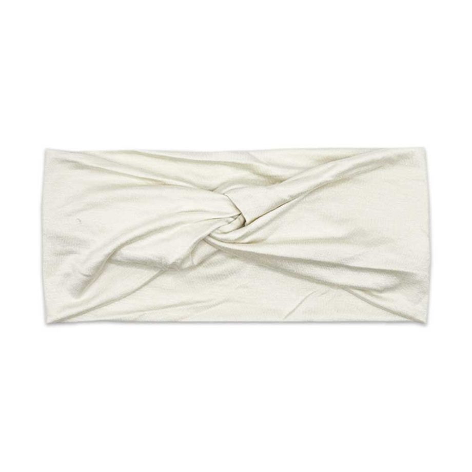 An Isla - Kids Bamboo Headwrap by Tiny Knot Co on a white background.