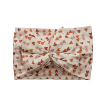 A pink and orange Bamboo Baby Knotted Headwrap with hearts from Tiny Knot Co.