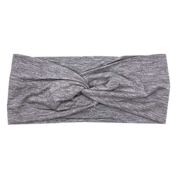 A Georgia - Women's Bamboo Headwrap headband with a knot from Tiny Knot Co.