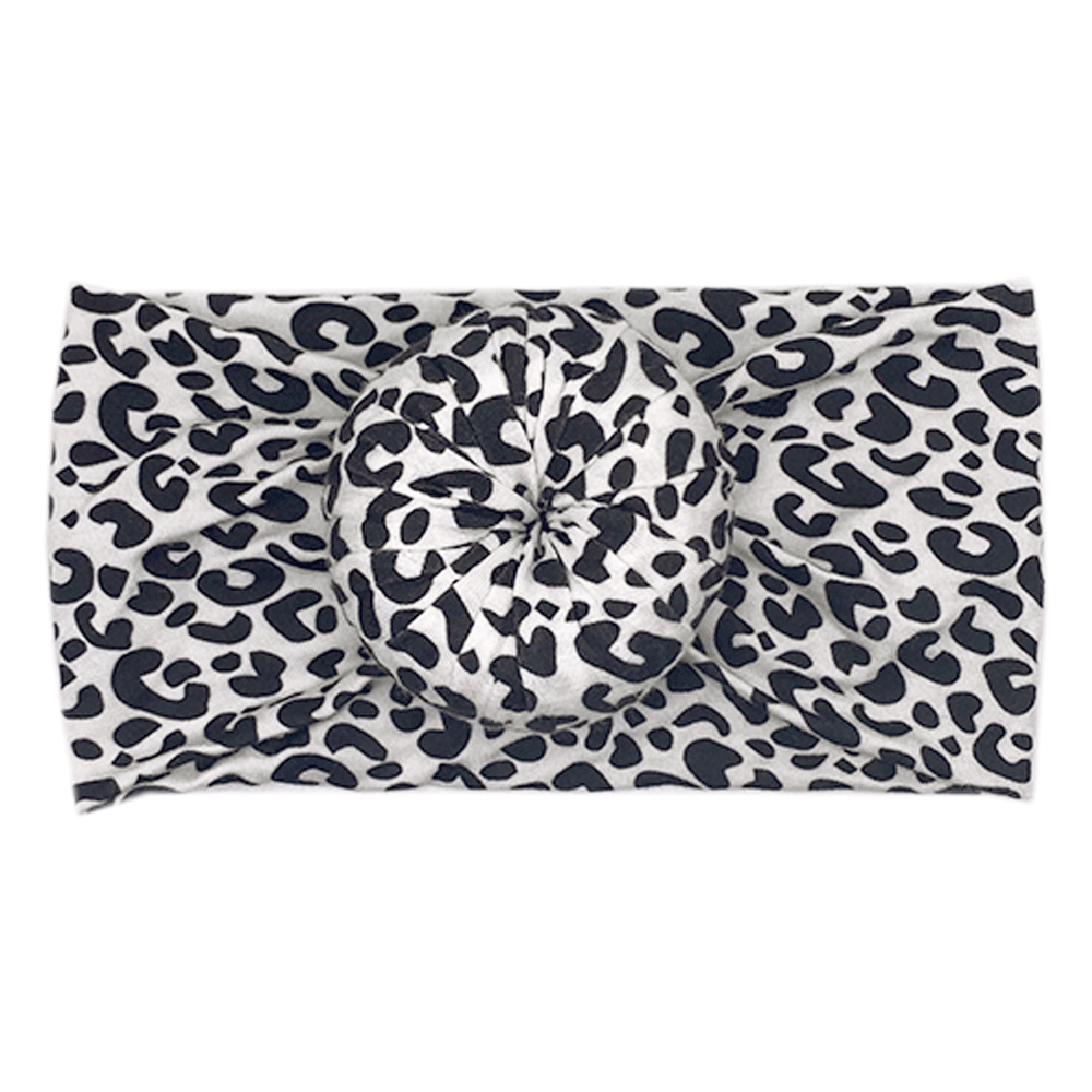 A Lola, Black - Bamboo Tiny Knot Co Baby Knotted Headwrap leopard print headband.