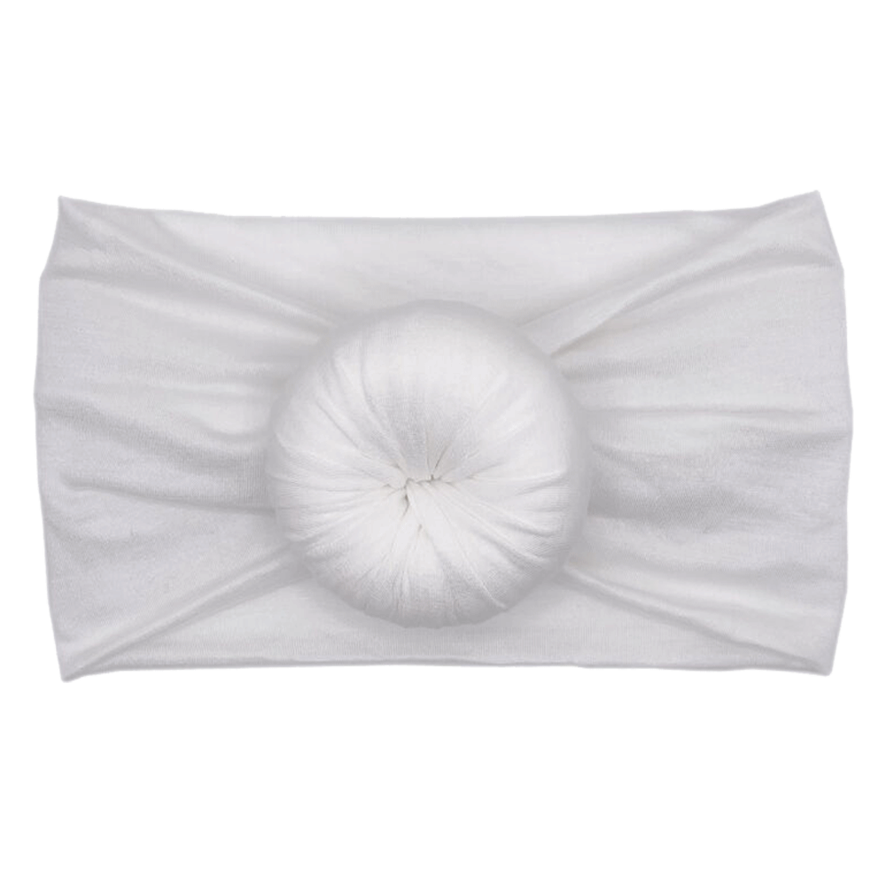 A white Heather - Bamboo Baby Knotted Headwrap featuring a ball, from Tiny Knot Co.