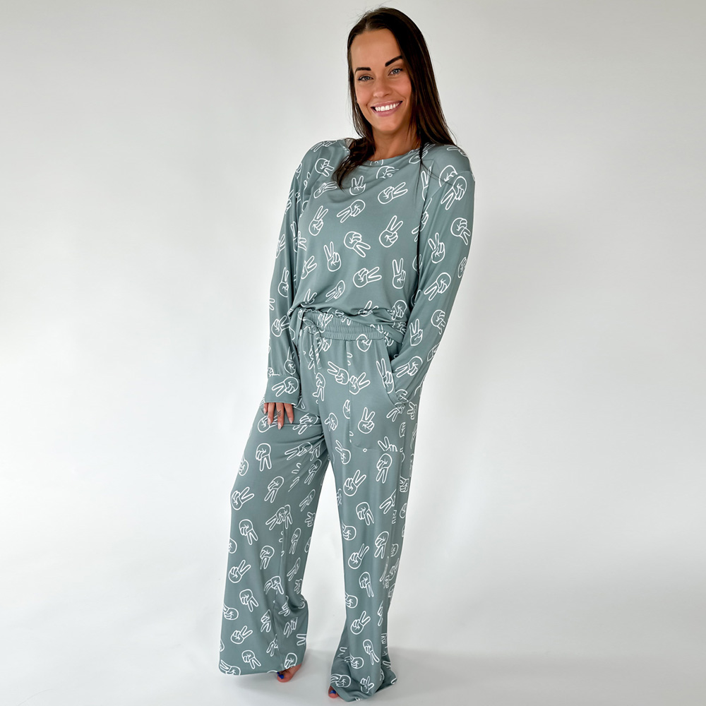 Woman in blue gray TENCEL™ modal baby pajamas, Tiny Knot Co 